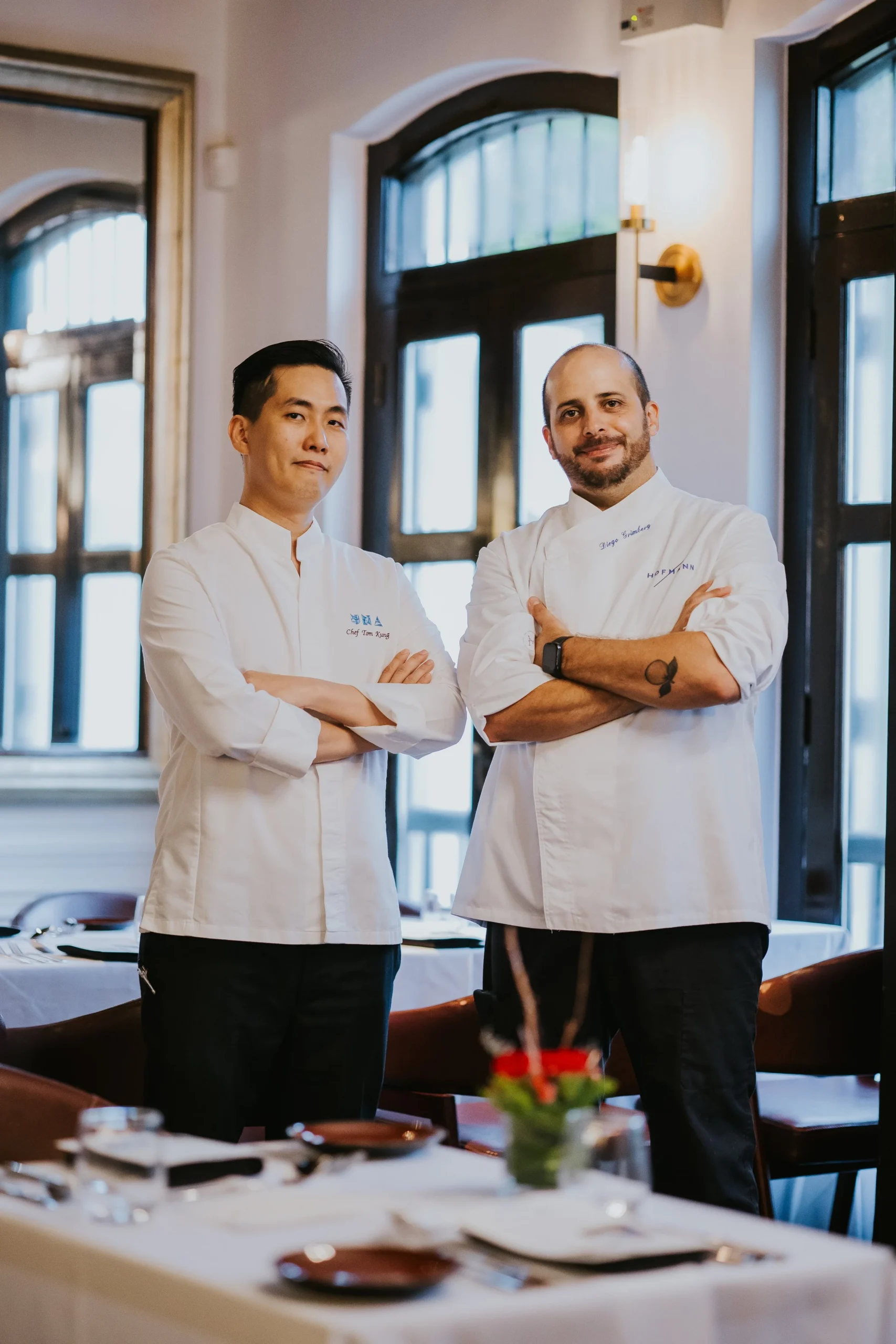 Michelin-star chef advisor Diego Grimberg with the UNA kitchen team at The Alkaff Mansion